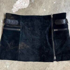 black leather mini skirt with buckle